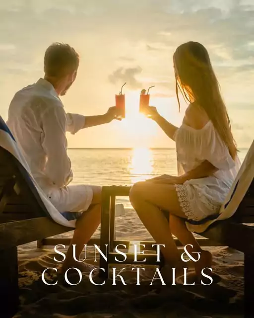 A vibrant beach scene featuring Sense by the Beach, Coral Bay's new beach bar and restaurant, with patrons enjoying drinks and meals under colorful umbrellas.